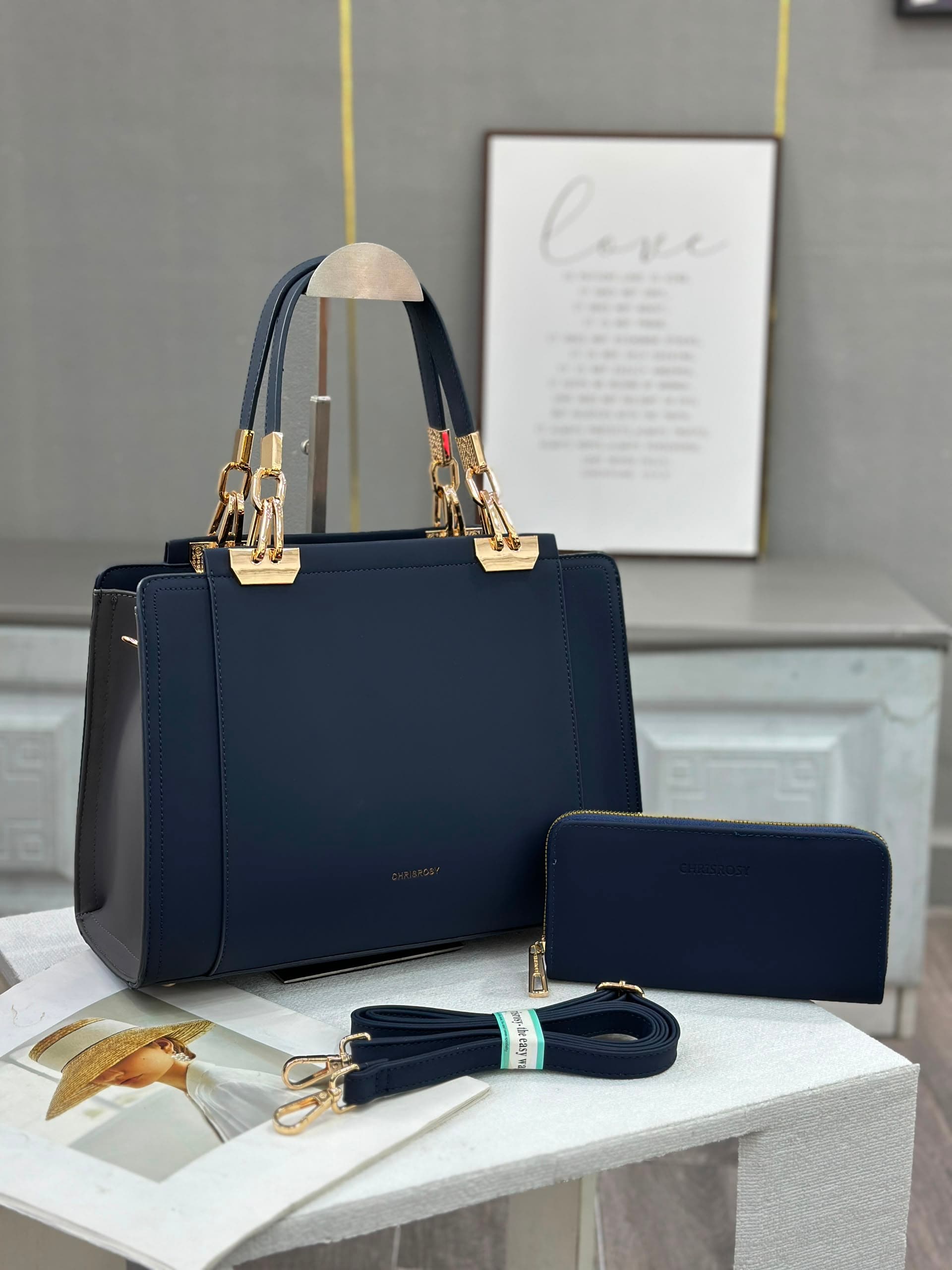 This structured top-handle handbag